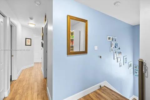 a view of a hallway with entryway