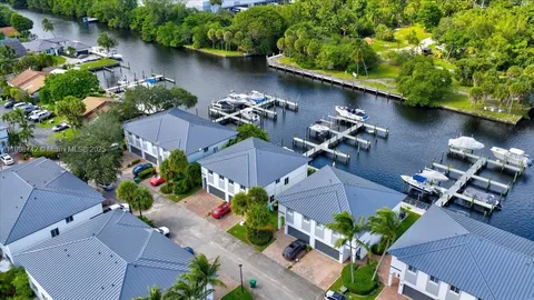 an aerial view of a house with outdoor space