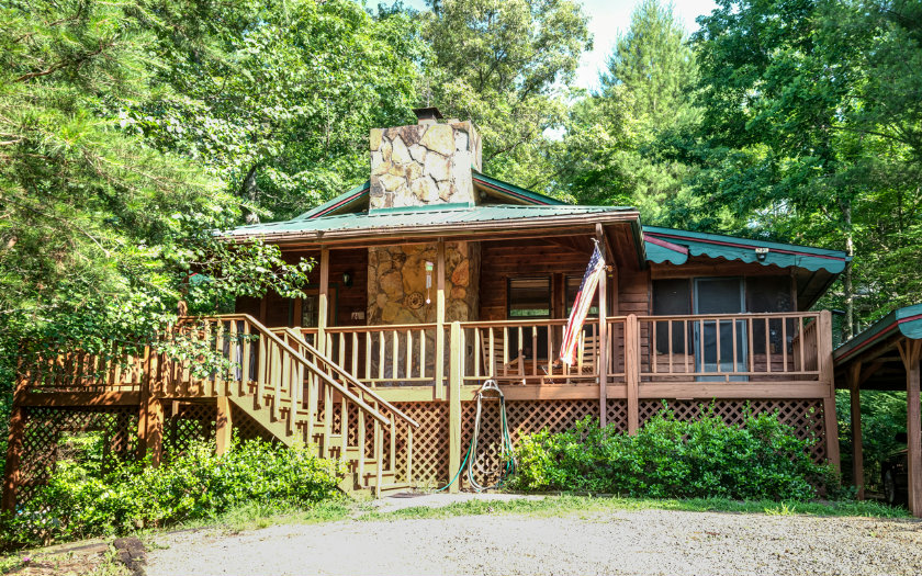 220 Tree Top Terrace Murphy, NC 28906 - Photo 1 of 1 a view of a house with a small yard and wooden fence
