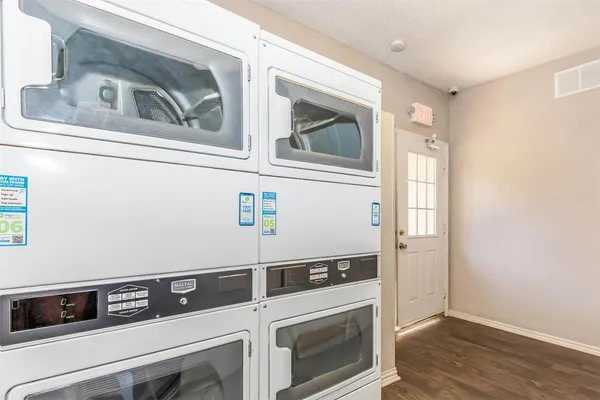 a utility room with washer and dryer