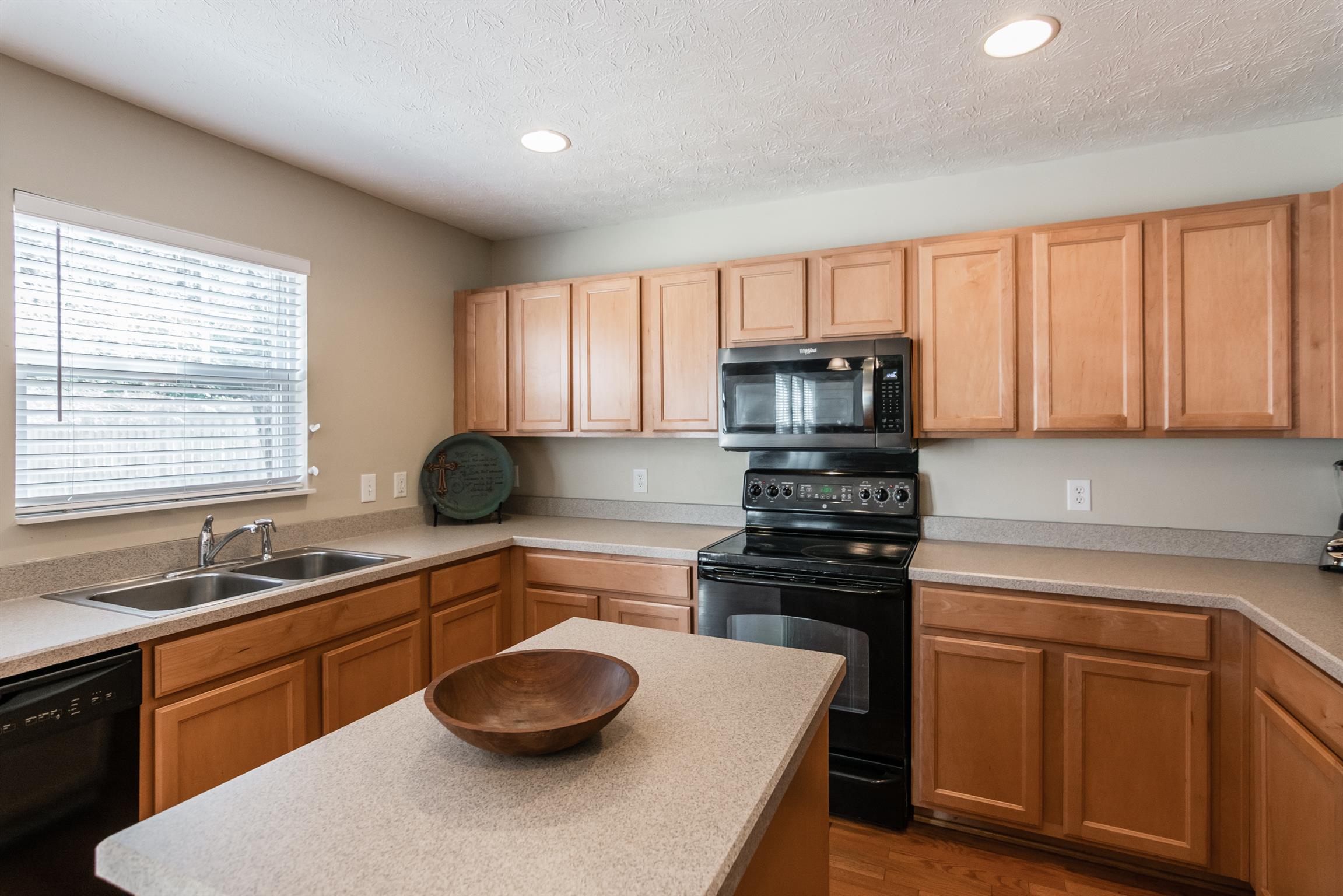 3909 Stephens Ridge Way Antioch, TN 37013 - Photo 9 of 25 a kitchen with a sink appliances and cabinets