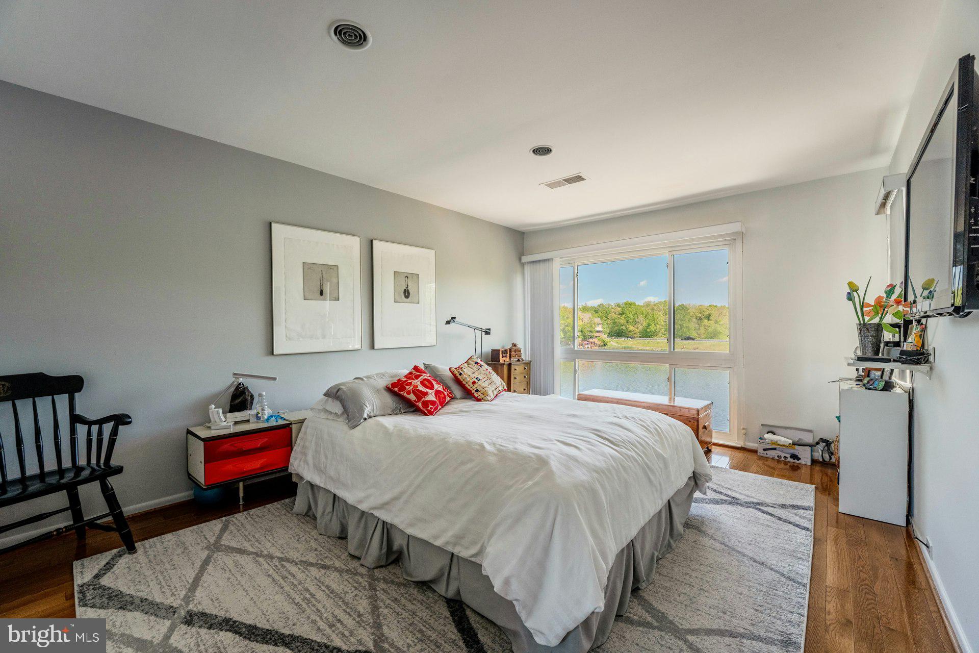 2013 Lakewinds Drive Reston, VA 20191 - Photo 27 of 54 Primary suite with views of the lake