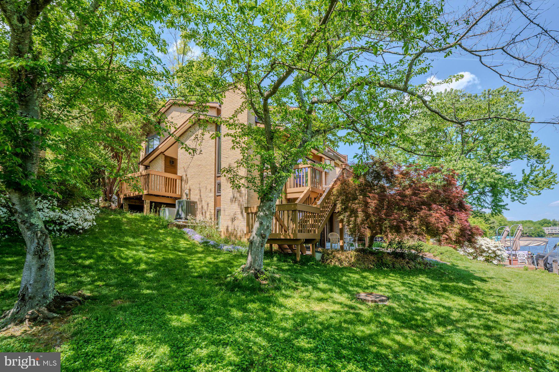 2013 Lakewinds Drive Reston, VA 20191 - Photo 3 of 54 Side view with lush landscaping