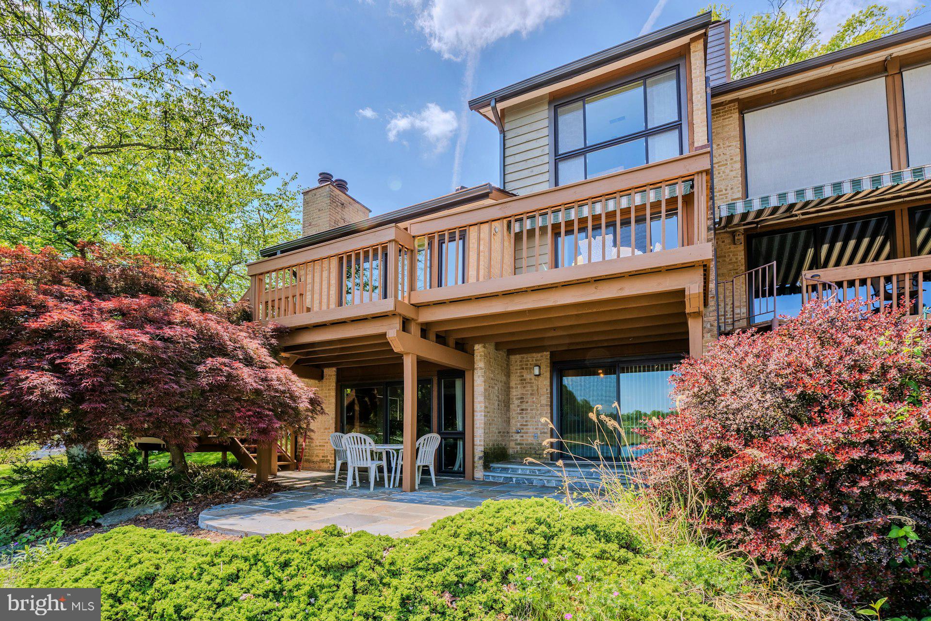 2013 Lakewinds Drive Reston, VA 20191 - Photo 4 of 54 Rear of home with large deck and stone patio
