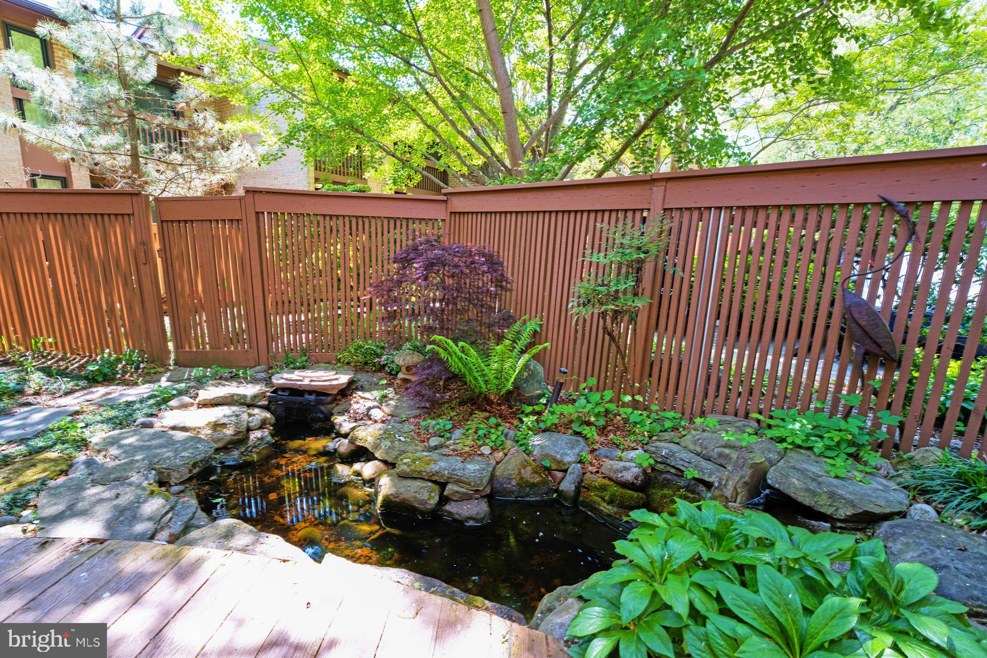 2013 Lakewinds Drive Reston, VA 20191 - Photo 6 of 54 Peaceful Koi pond