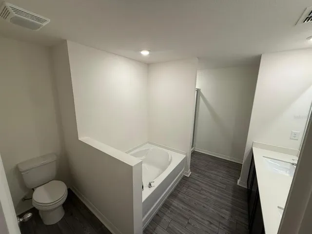 a bathroom with a sink and a toilet
