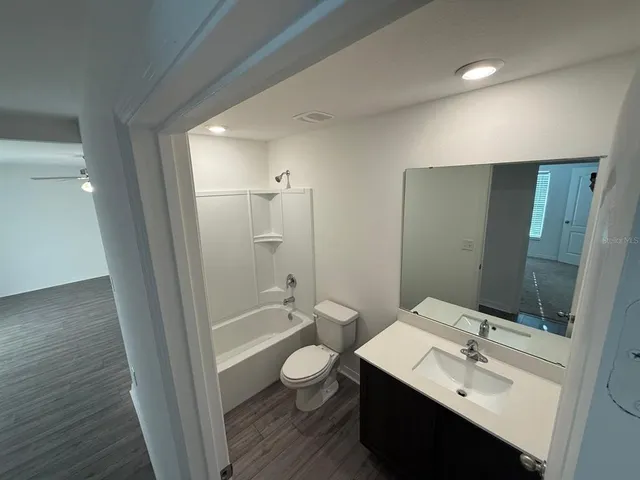 a view of room with hardwood floor