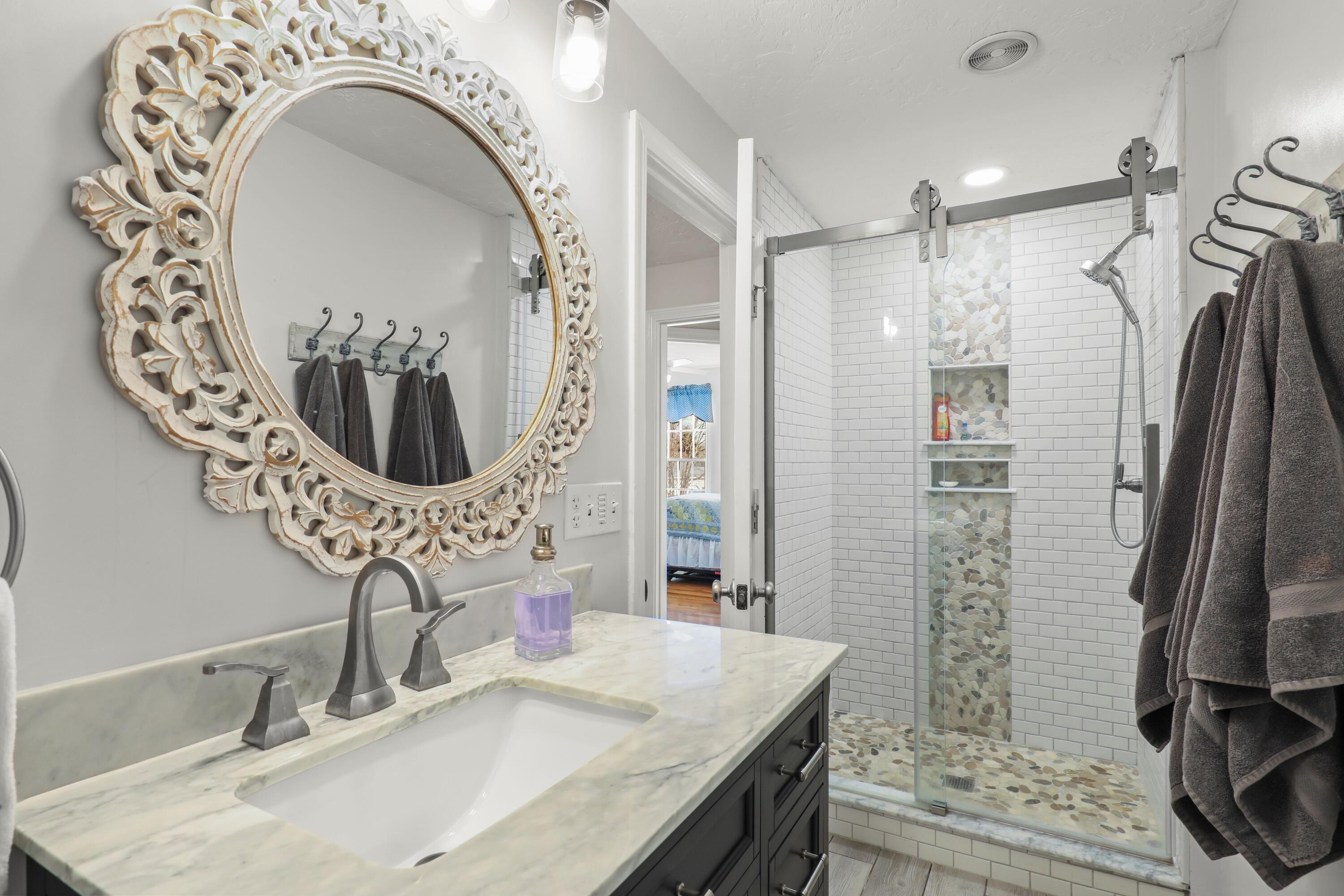 5 Vesper Drive Pocasset, MA 02559 - Photo 16 of 20 a bathroom with a sink mirror and vanity