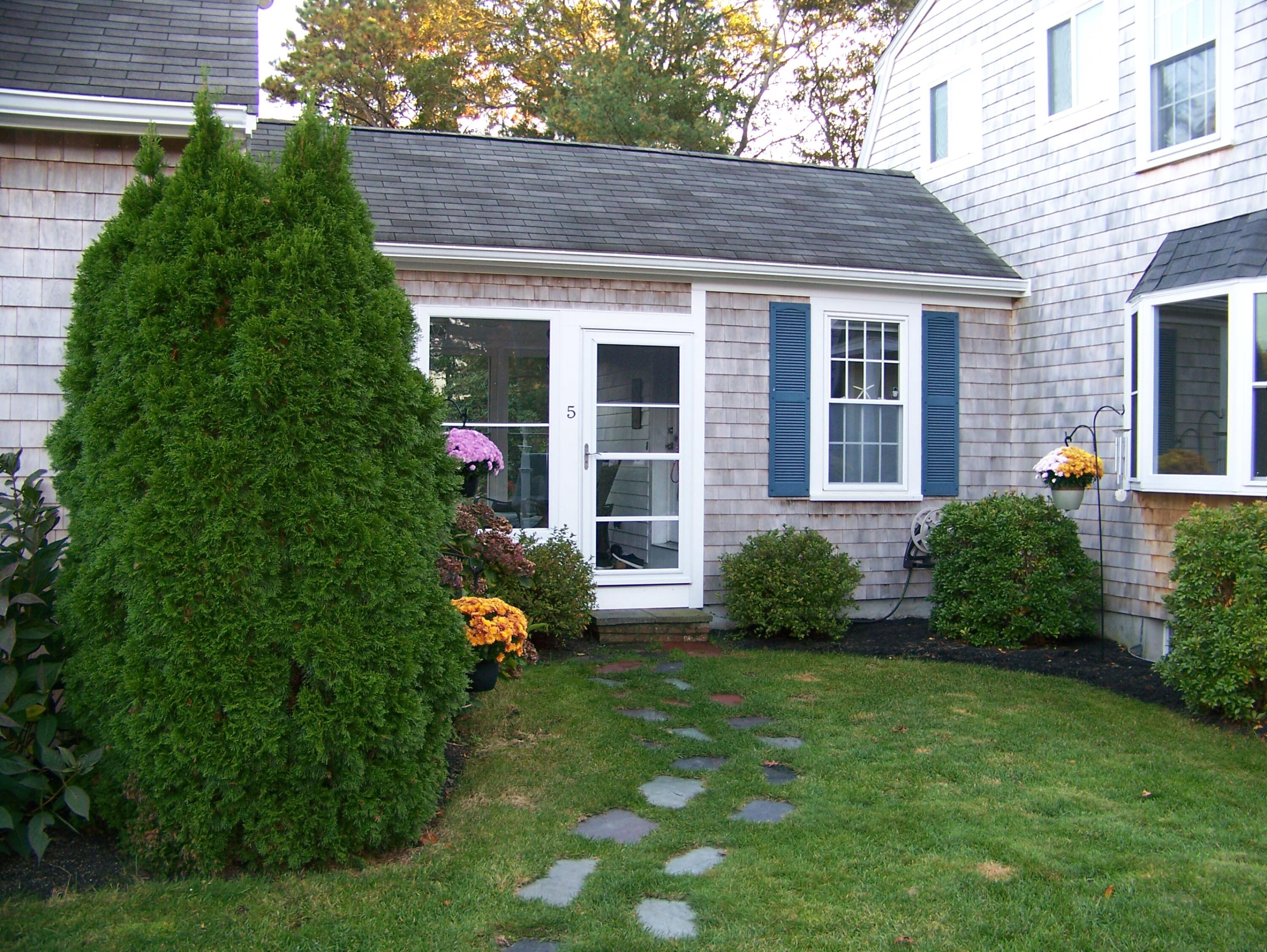 5 Vesper Drive Pocasset, MA 02559 - Photo 3 of 20 a view of a house with a yard and plants