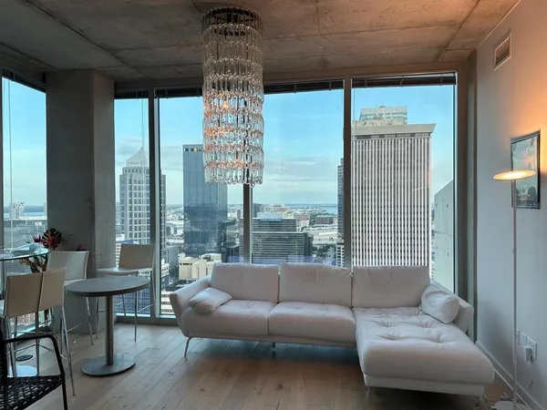 a bathroom with a shower and a sink