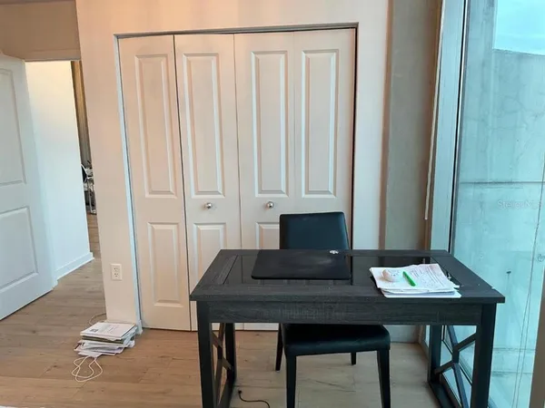 a view of a dining room with furniture window and outside view