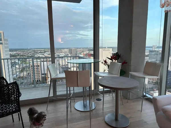a view of livingroom with hardwood floor and staircase