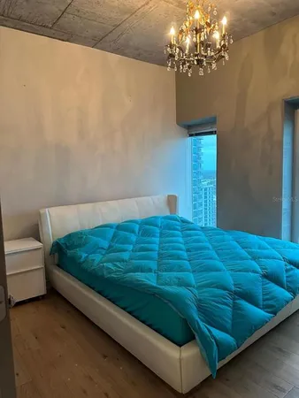 a kitchen with a refrigerator and a stove