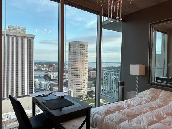 a bathroom with a double vanity sink and mirror