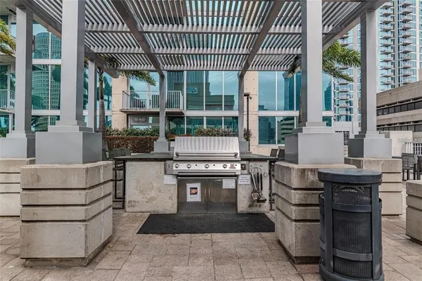 a kitchen with a sink and counter top space