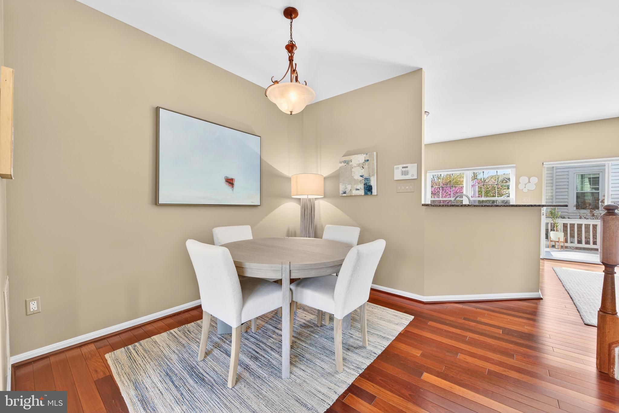 12017 Edgemere Circle Reston, VA 20190 - Photo 11 of 30 a view of a dining room with furniture and wooden floor