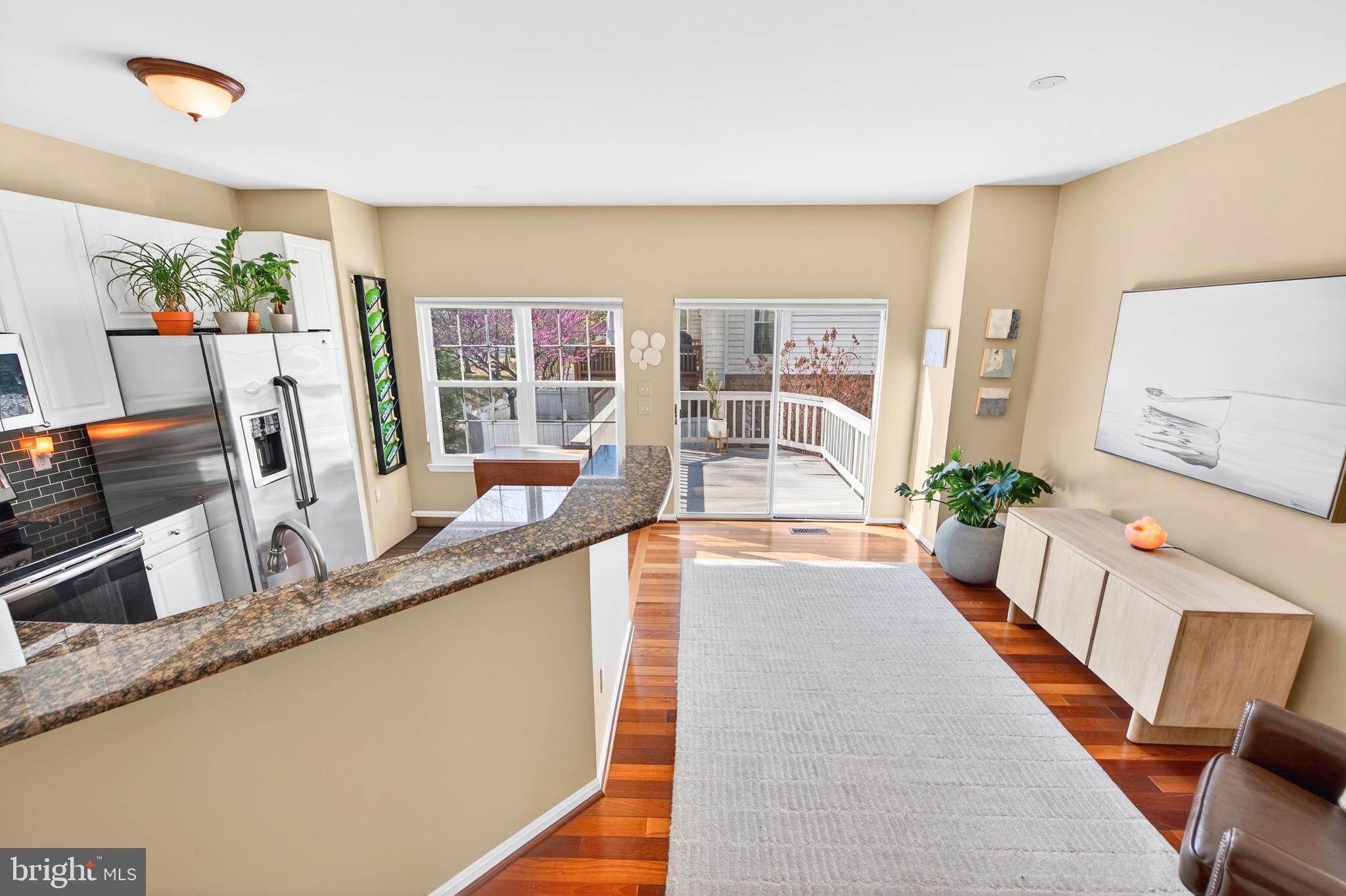 12017 Edgemere Circle Reston, VA 20190 - Photo 17 of 30 a large white kitchen with a large window