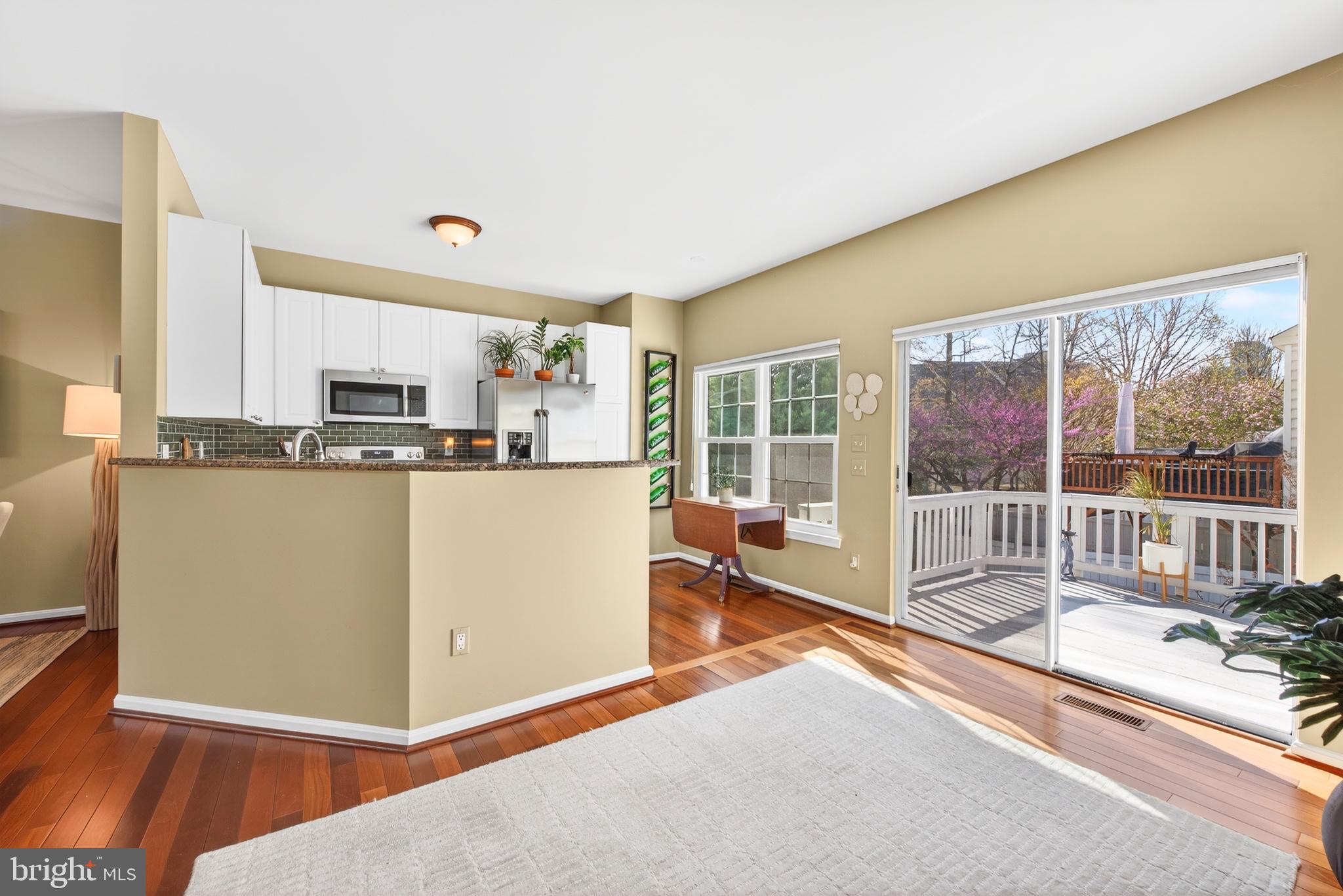 12017 Edgemere Circle Reston, VA 20190 - Photo 18 of 30 a kitchen with stainless steel appliances a sink a stove and a refrigerator