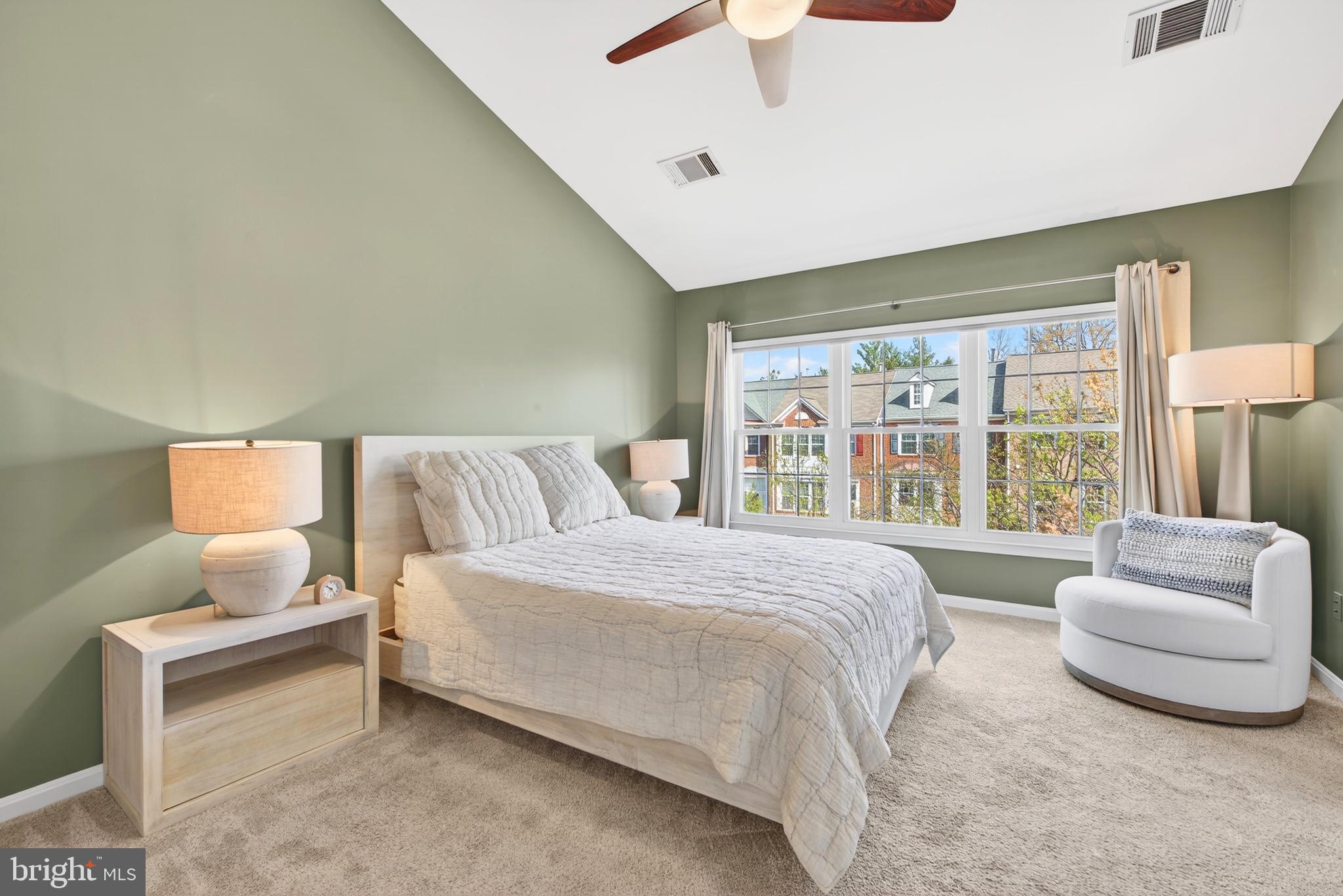 12017 Edgemere Circle Reston, VA 20190 - Photo 24 of 30 a bedroom with a bed and a large window