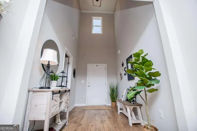 a spacious bedroom with a bed and a couch