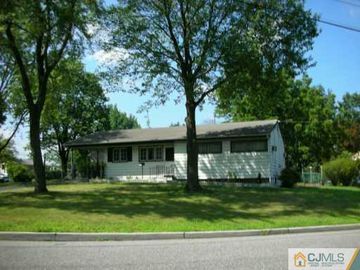 210 Princeton Road Old Bridge, NJ 08859 - Photo 2 of 8 front view of a house with a yard