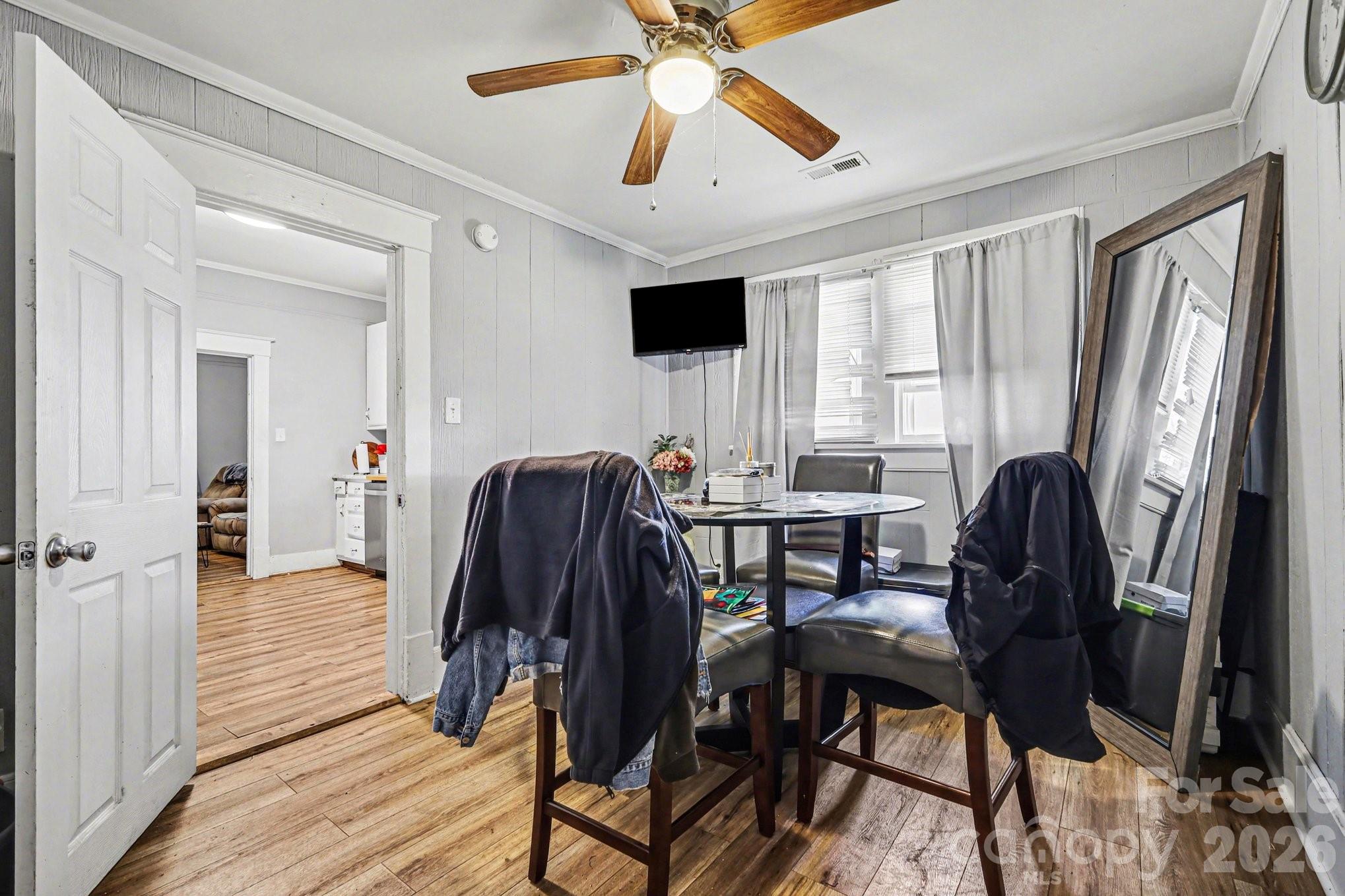 522 Elm Street Salisbury, NC 28144 - Photo 14 of 20 a workspace with wooden floor and windows