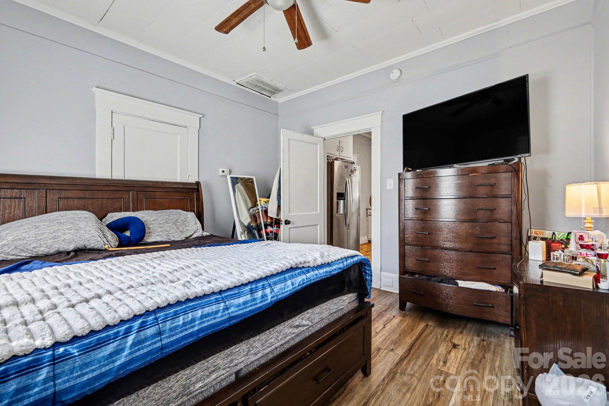 522 Elm Street Salisbury, NC 28144 - Photo 15 of 20 a living room with a bed and flat screen tv