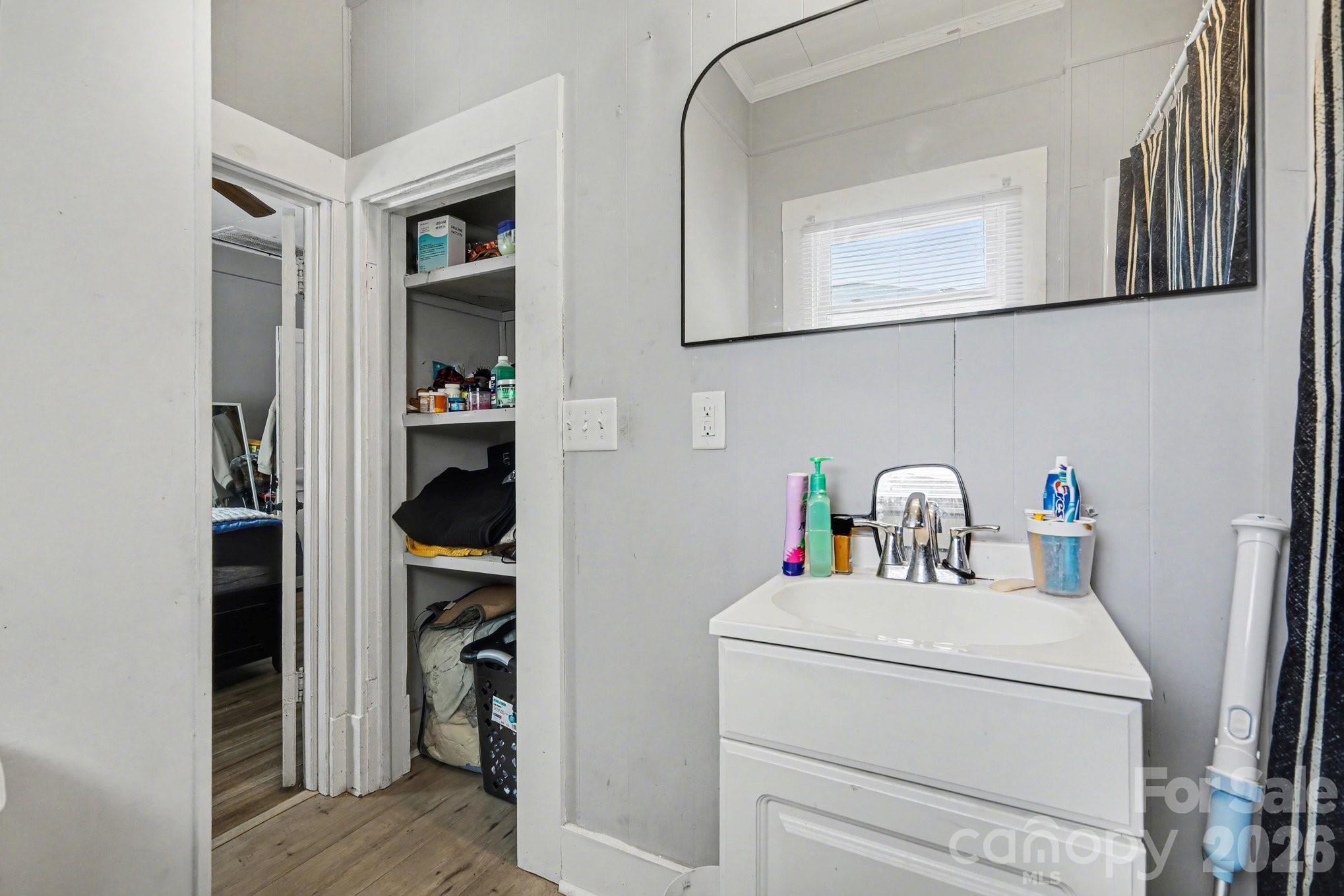 522 Elm Street Salisbury, NC 28144 - Photo 18 of 20 a bathroom with a toilet and a sink