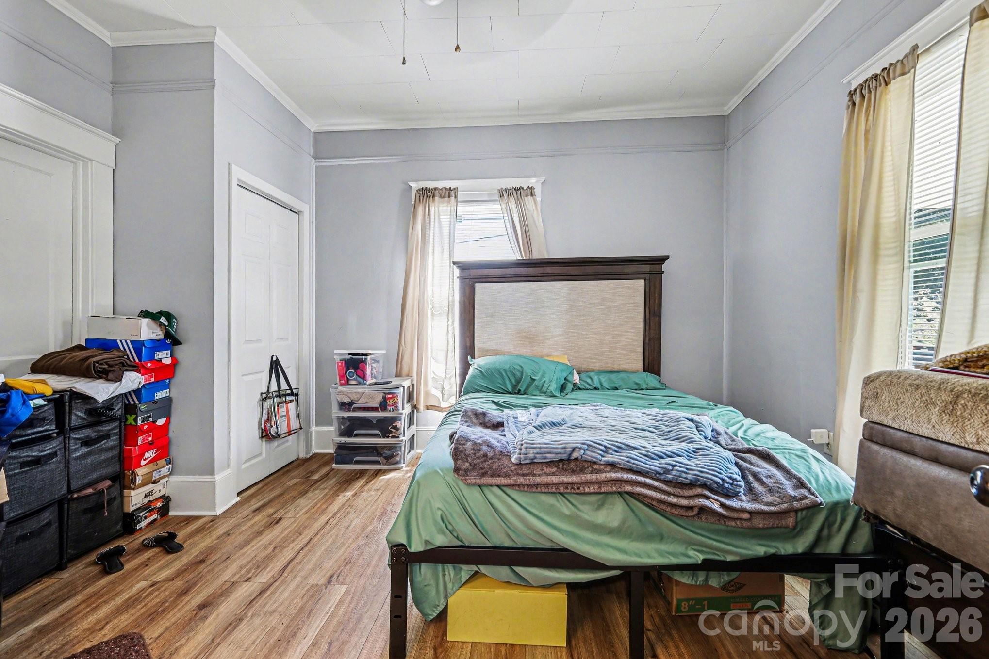 522 Elm Street Salisbury, NC 28144 - Photo 19 of 20 a bedroom with a bed and a closet