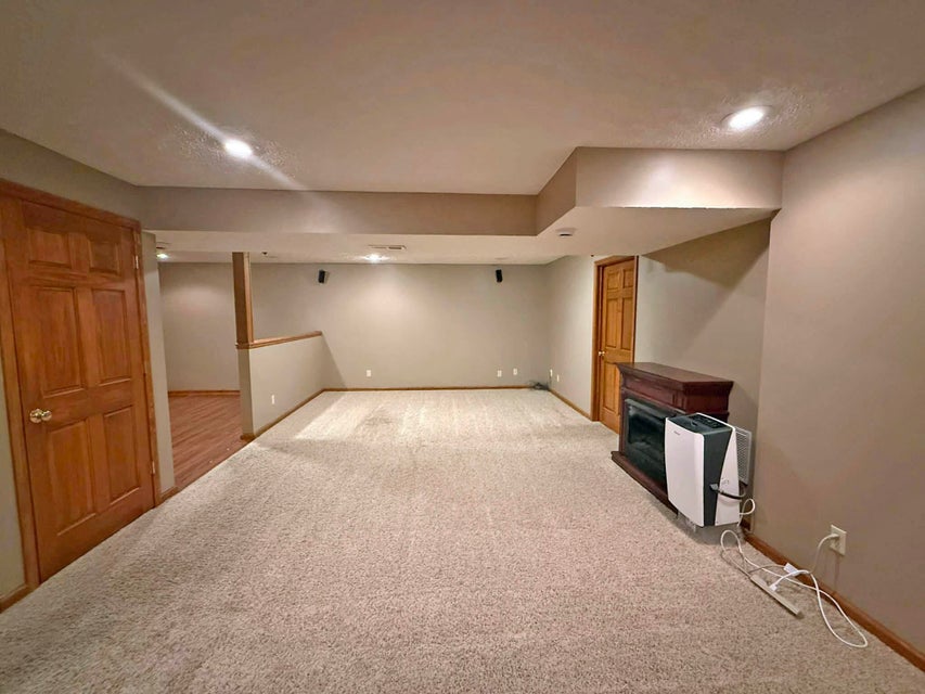 541 North Point Troy, OH 45373 - Photo 18 of 23 This versatile basement space offers ample room for recreation and features durable carpeting.