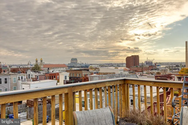 a view of a balcony with city view