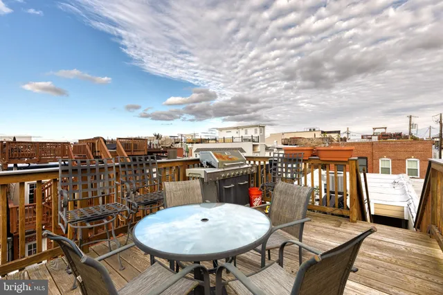 a view of a chairs and table in the terrace