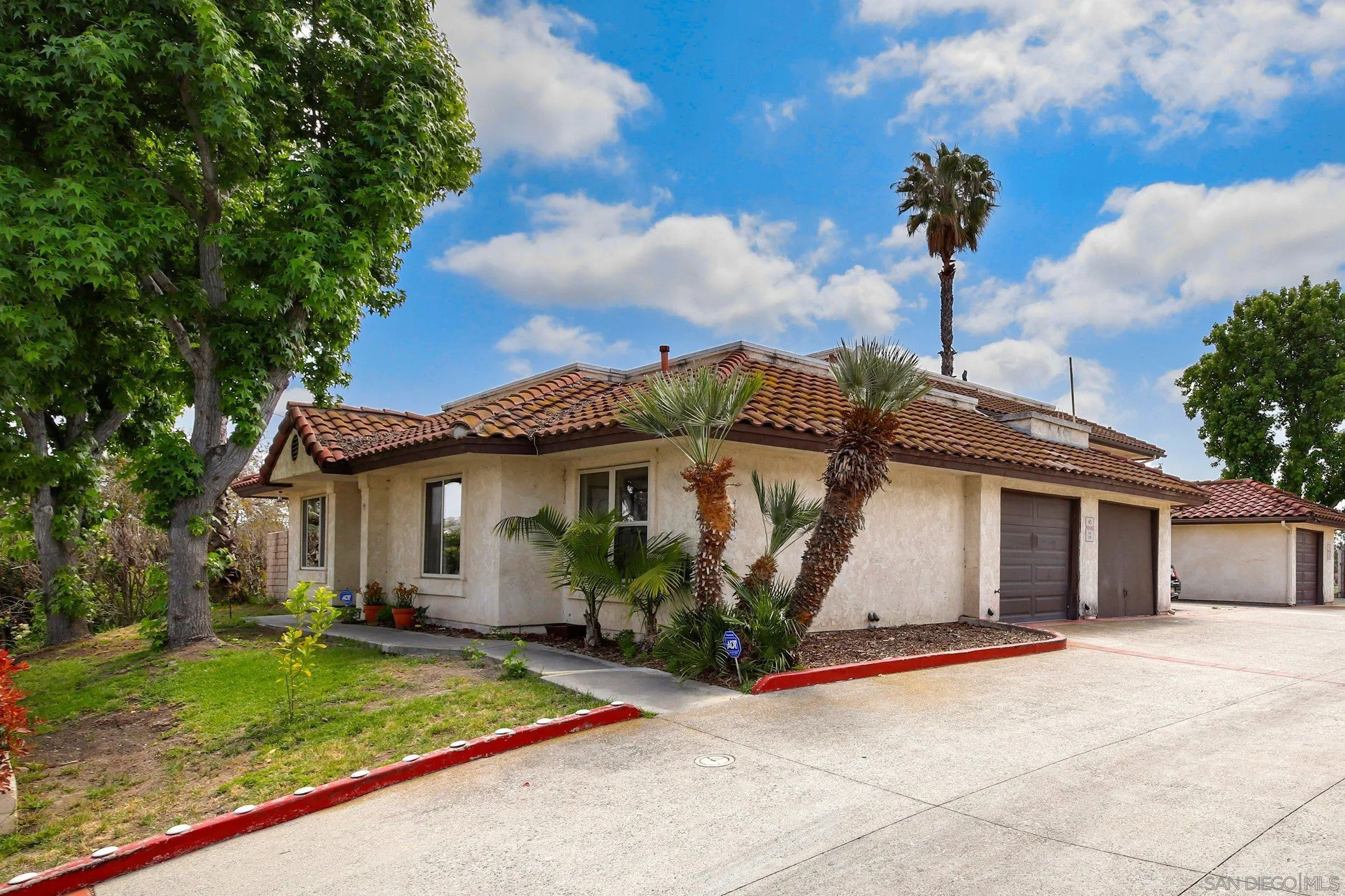 320 Grapevine Road, Unit 15 Vista, CA 92083 - Photo 18 of 18 a front view of a house with garden