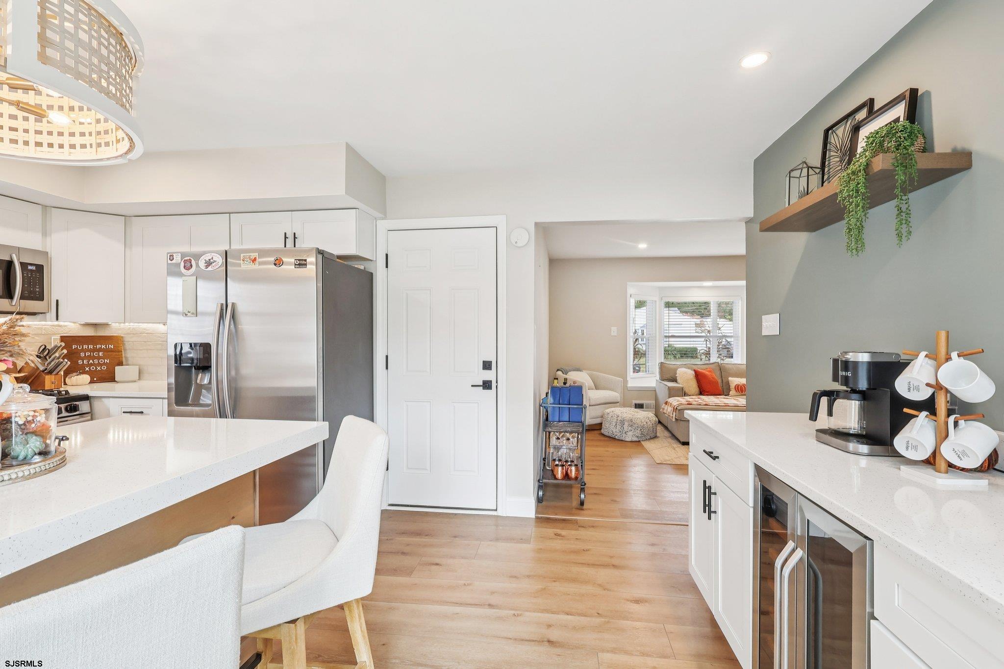 13 Gulph Mill Road Somers Point, NJ 08244 - Photo 16 of 43 a kitchen with stainless steel appliances granite countertop a refrigerator and a sink