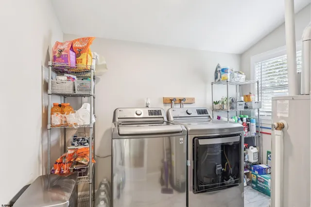 a utility room with dryer and washer