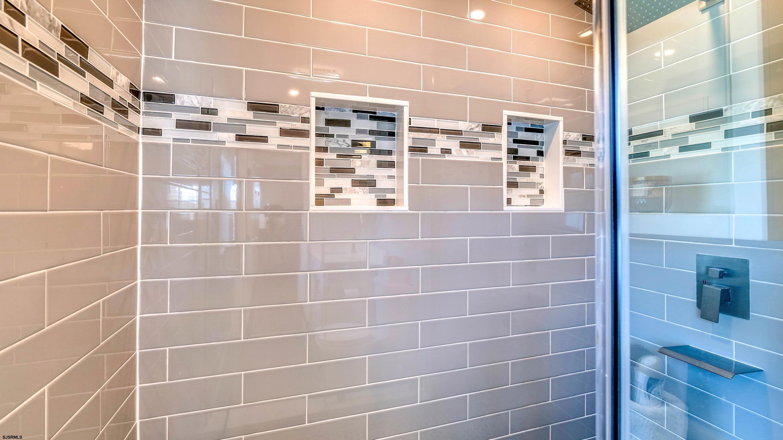 13 Gulph Mill Road Somers Point, NJ 08244 - Photo 27 of 43 a bathroom with a shower