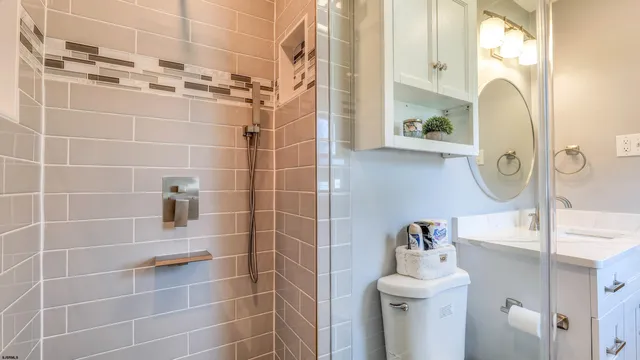 a bathroom with a sink and toilet