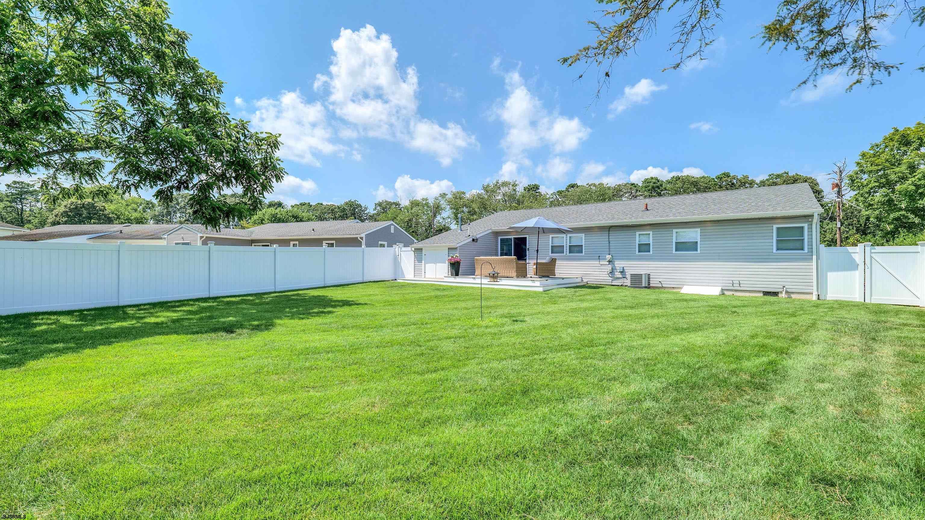 13 Gulph Mill Road Somers Point, NJ 08244 - Photo 36 of 43 a view of house with a yard