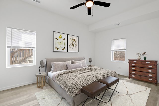 40 West Main Street Chicago Heights, IL 60411 - Photo 12 of 27 a bedroom with a bed and a window