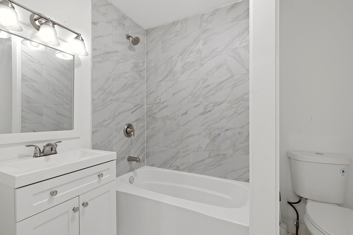 40 West Main Street Chicago Heights, IL 60411 - Photo 14 of 27 a bathroom with a sink a toilet and shower