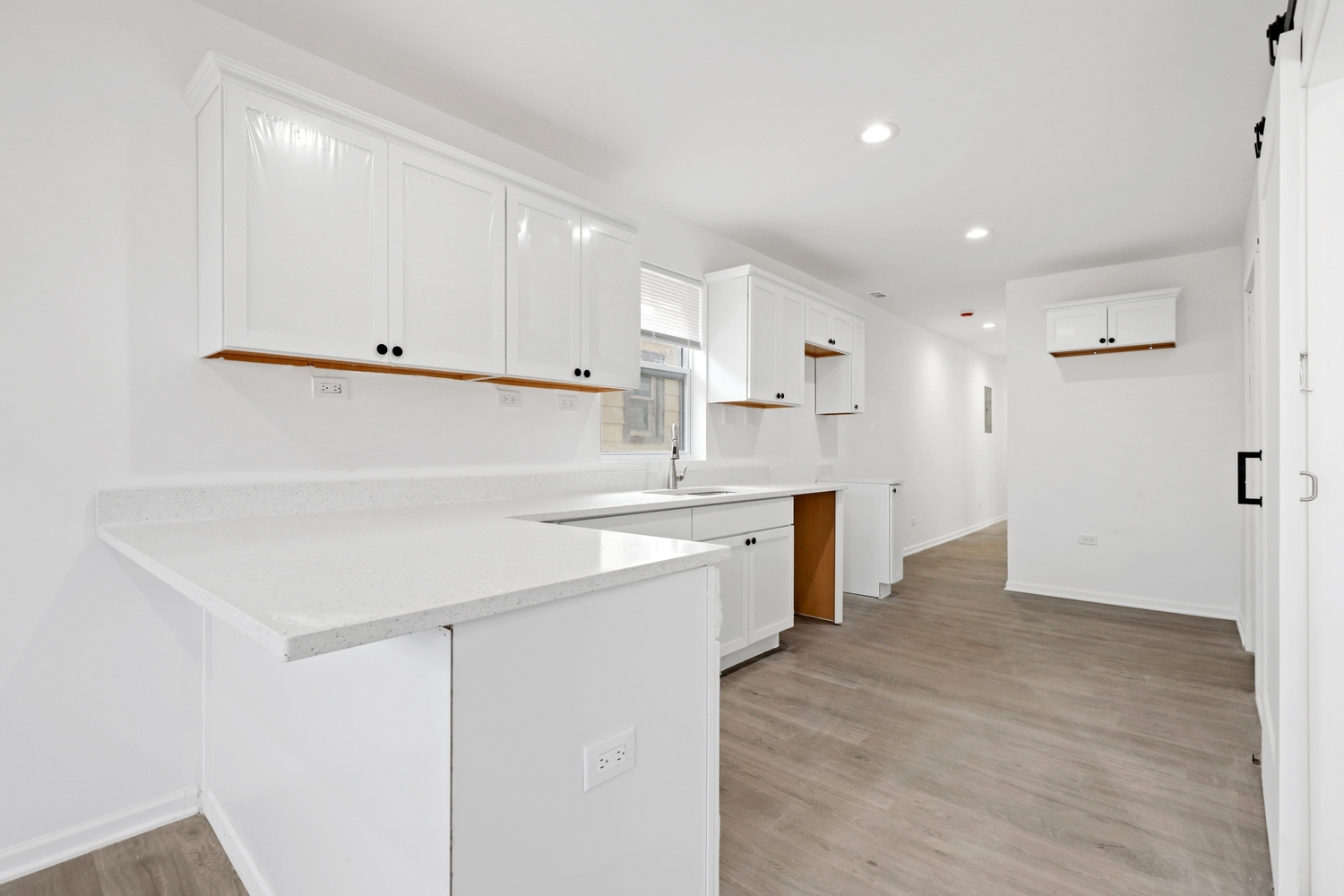 40 West Main Street Chicago Heights, IL 60411 - Photo 17 of 27 a kitchen with white cabinets and appliances