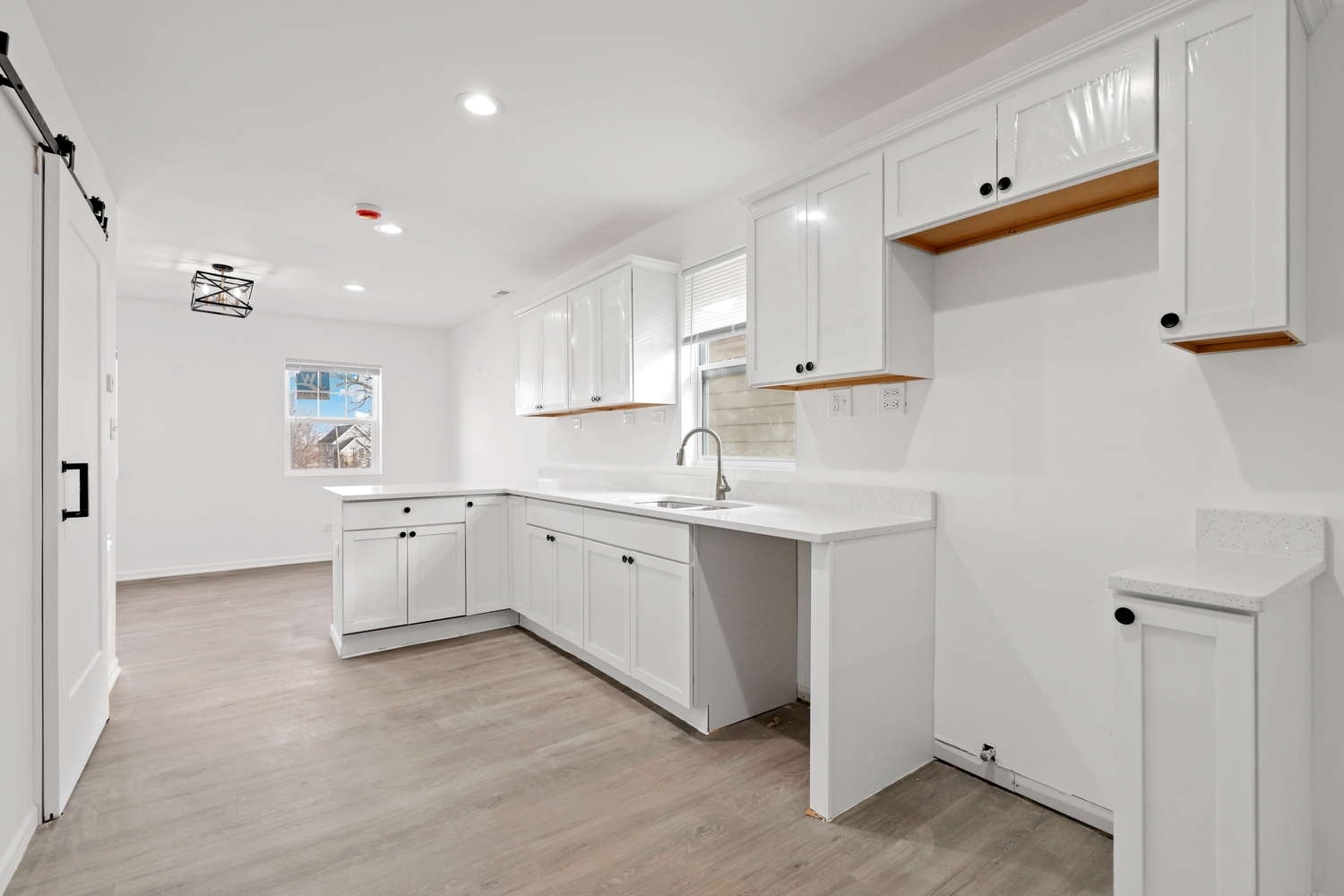 40 West Main Street Chicago Heights, IL 60411 - Photo 18 of 27 a kitchen with white cabinets and sink