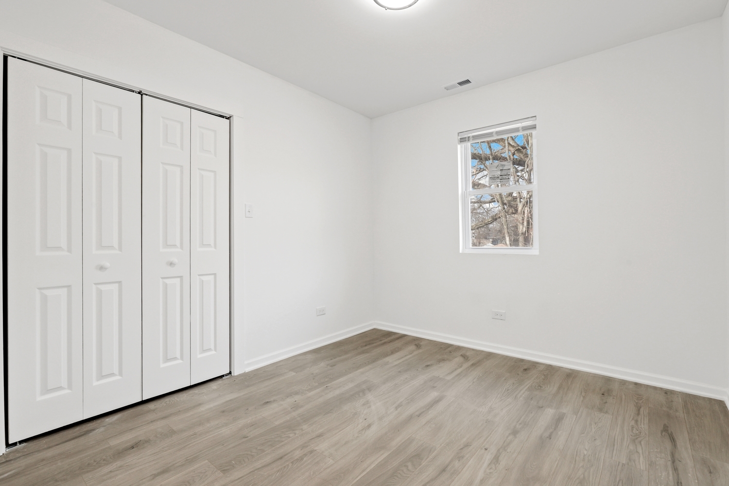 40 West Main Street Chicago Heights, IL 60411 - Photo 20 of 27 an empty room with wooden floor