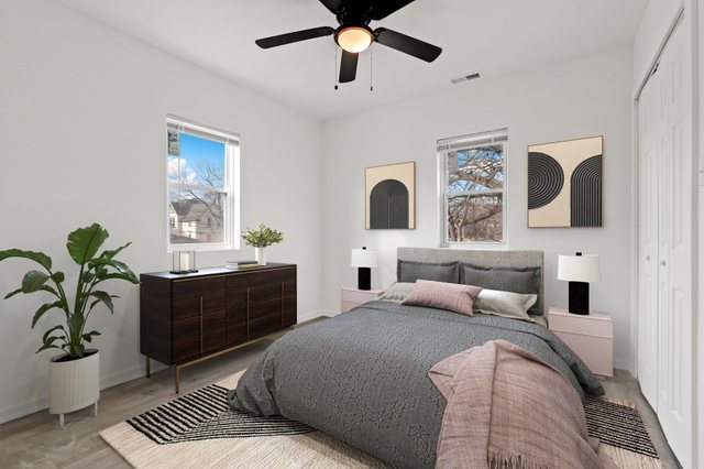 40 West Main Street Chicago Heights, IL 60411 - Photo 21 of 27 a bedroom with a bed and ceiling fan
