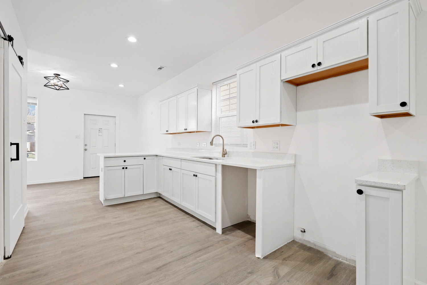 40 West Main Street Chicago Heights, IL 60411 - Photo 9 of 27 a kitchen with white cabinets and white appliances