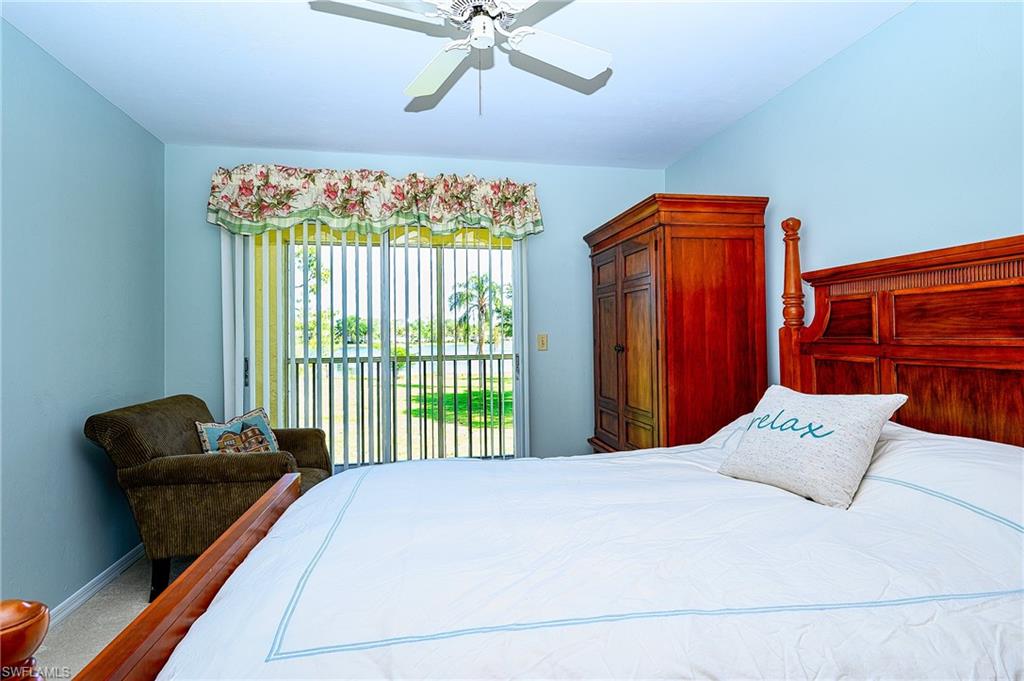 2650 Kings Lake Boulevard, Unit 6202 Naples, FL 34112 - Photo 14 of 26 Primary Bedroom