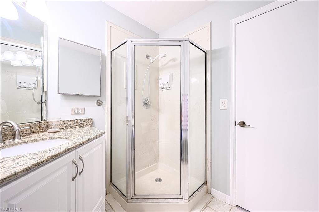 2650 Kings Lake Boulevard, Unit 6202 Naples, FL 34112 - Photo 16 of 26 Primary Bathroom