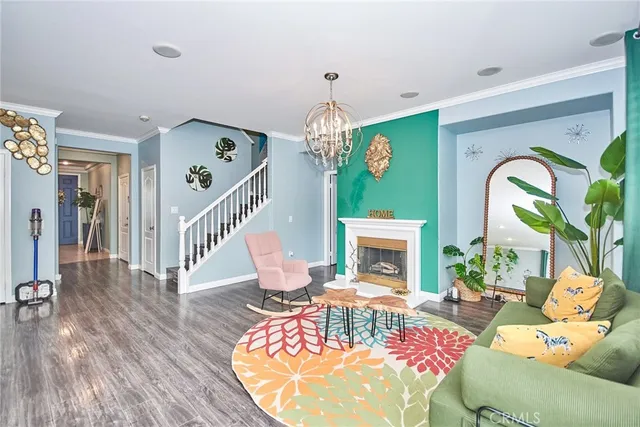 a kitchen with stainless steel appliances kitchen island granite countertop a refrigerator and a stove top oven