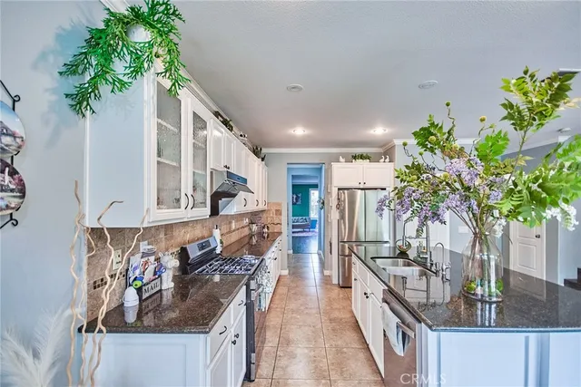 a view of a livingroom with furniture and wooden floor