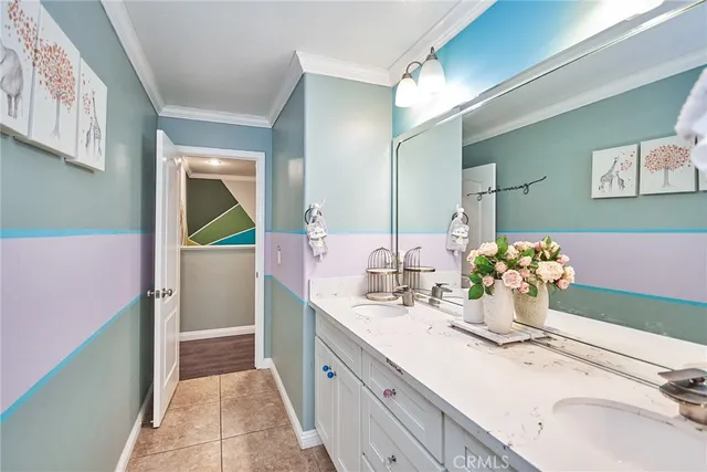 a living room with a bed furniture and a window